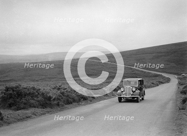GK Collier's Wolseley Wasp, winner of a silver award at the MCC Torquay Rally, July 1937. Artist: Bill Brunell.