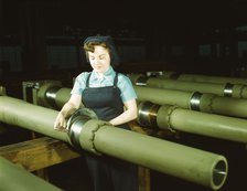 Gist inspector, Mrs. Mary Betchner inspecting one of the 25 cutters..., Milwaukee, Wis. , 1943. Creator: Howard Hollem.