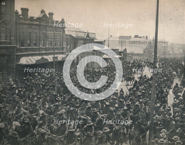 'Boer Commando passing through Johannesburg (Second Transvaal War)', c1900. Creator: Unknown.