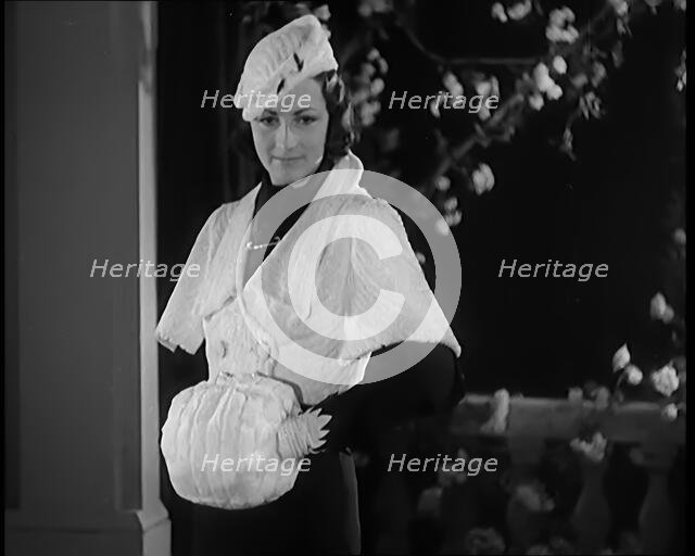 Female Civilian Modelling the Latest Fashions in a Fashion Show, 1931. Creator: British Pathe Ltd.