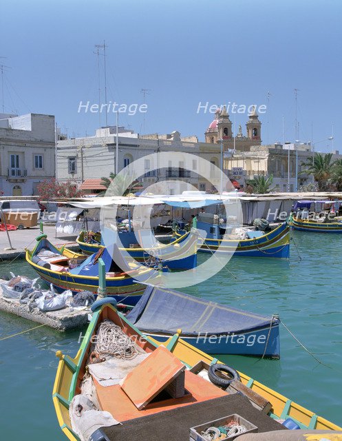 Fishing boats in the harbour, Marsaxlokk, Malta. 