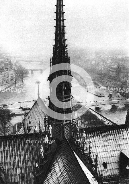 The spire of Notre Dame seen from the towers, Paris, 1931.Artist: Ernest Flammarion