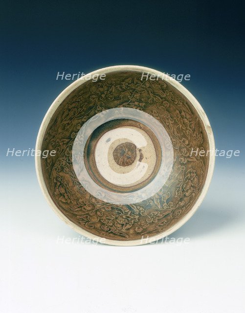 White rimmed celadon bowl with moulded peony scrolls, Jin dynasty, China, 13th century. Artist: Unknown