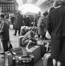 Passengers at Victoria Station, London, 1960-1972. Artist: John Gay