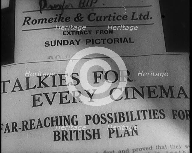A Shot of the Film Weekly. Headline Reads: 'Talkies for Every Cinema. Far Reaching..., 1929. Creator: British Pathe Ltd.