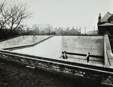 Boys playing in a fives court, Strand School, London, 1914. Artist: Unknown.