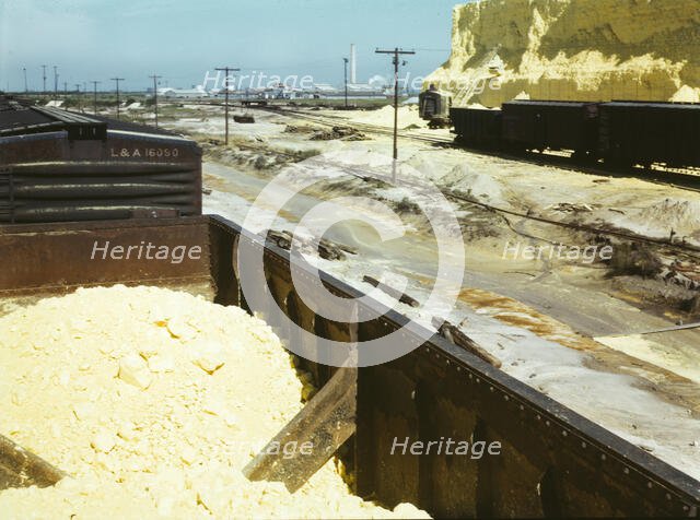 Railroad cars loaded with sulphur, Freeport Sulphur Co., Hoskins Mound, Texas, 1943. Creator: John Vachon.