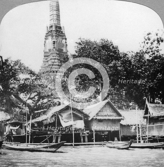 Dhows and houses on the Chao Phraya River, Bangkok, Thailand, 1900s. Artist: Unknown