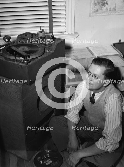 Portrait of Gordon Gullickson in his shop, 1100 25th Street NW, Washington, D.C., ca. Dec. 1941. Creator: William Paul Gottlieb.