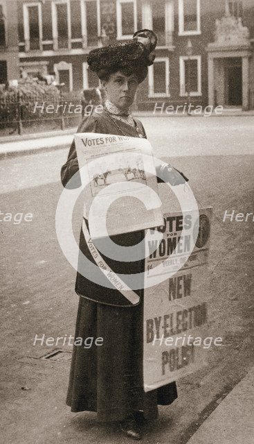 Miss Kelly, a suffragette, selling Votes for Women, July 1911. Artist: Unknown