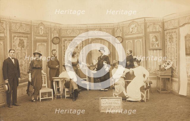 Prisoners of war, some in drag, posing on stage in 'Miquette et sa mere' at..., (1910-1919?). Creator: Unknown.
