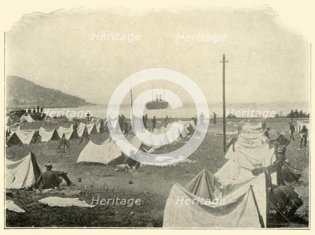 "St. Paul" in Bay, firing over Top of Hill...June 24th', Spanish-American War, 1898, (1899). Creator: Burr McIntosh.