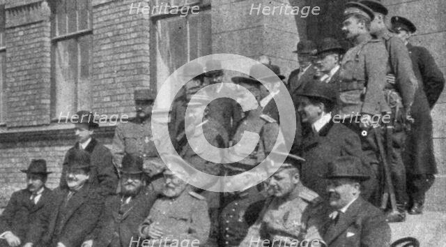 'France et Russie; Aux usines Poutilof: M. Albert Thomas est assis au premier rang..., 1916. Creator: Unknown.