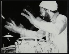 Percussionist Guilherme Franco playing at the Newport Jazz Festival, Middlesbrough, 1978. Artist: Denis Williams