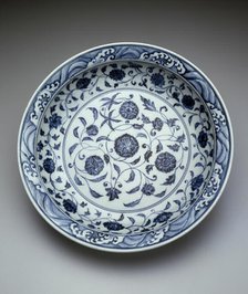 Dish with Scrolling Flowers and Breaking Waves, Ming dynasty (1368-1644), early 15th century. Creator: Unknown.