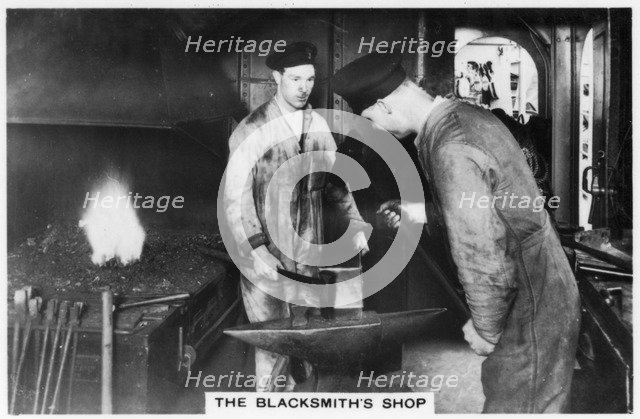 The blacksmith's shop on board the battleship HMS 'Nelson', 1937. Artist: Unknown