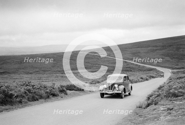 Ford V8 of J McEvoy, winner of a bronze award at the MCC Torquay Rally, July 1937. Artist: Bill Brunell.