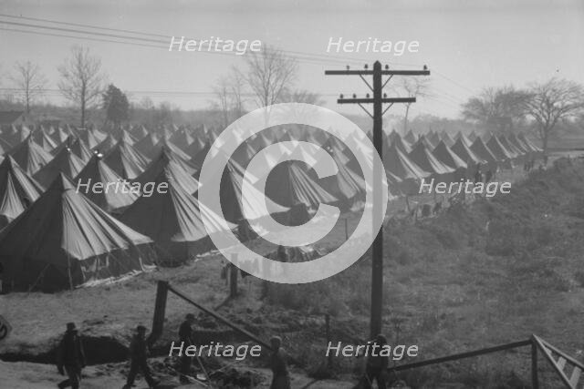 Possibly: Flood refugee encampment at Forrest City, Arkansas, ca. 1937. Creator: Walker Evans.