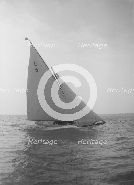 'Jonquil' heeling on upwind course, 1912. Creator: Kirk & Sons of Cowes.