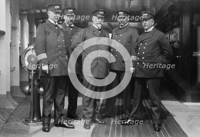 On the Imperator, Capt. H. von Meibom, Com. Ruser, Capt. A. Hoefer, Capt. H. Schetelig..., 1913. Creator: Bain News Service.