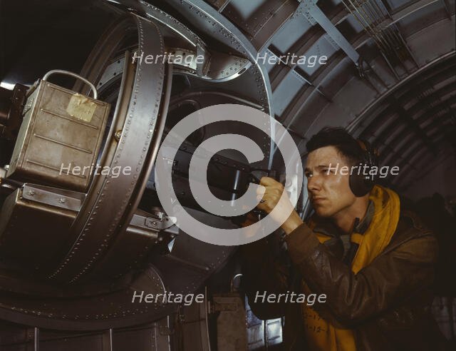 Hitler would like this man to go home and forget about the war..., 1942. Creator: Alfred T Palmer.