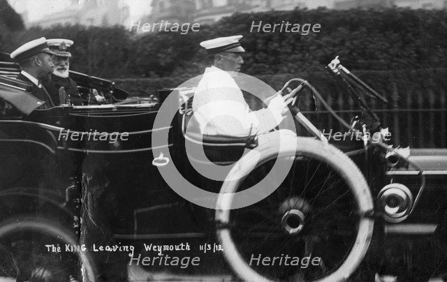 King George V leaving Weymouth, Dorset, by car, 11th March 1912. Artist: Unknown