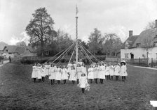 Children dance around the village maypole, East Hanney, Oxfordshire, c1860-c1922. Artist: Henry Taunt