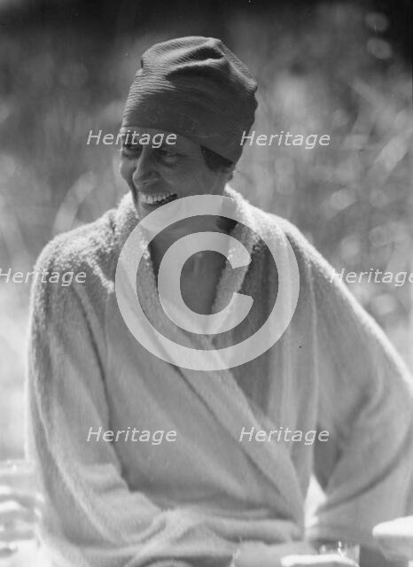 King, Hamilton, Mrs., seated outdoors, 1932 Creator: Arnold Genthe.