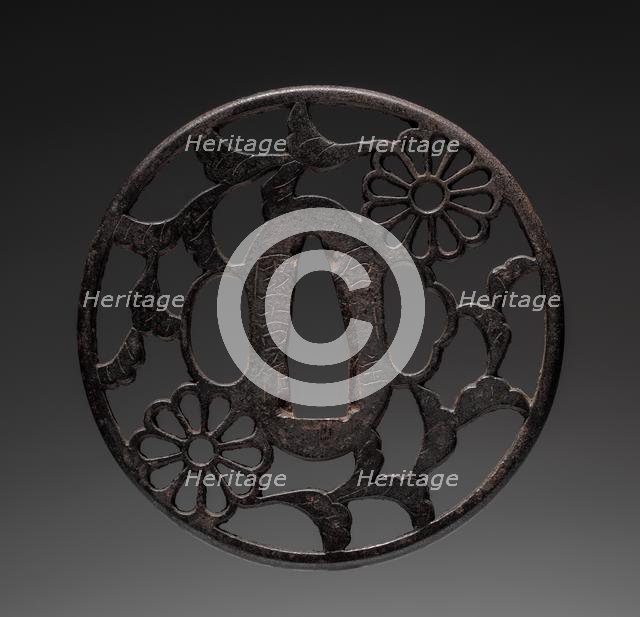 Sword Guard, late 17th century. Creator: Kuniyoshi (Japanese).