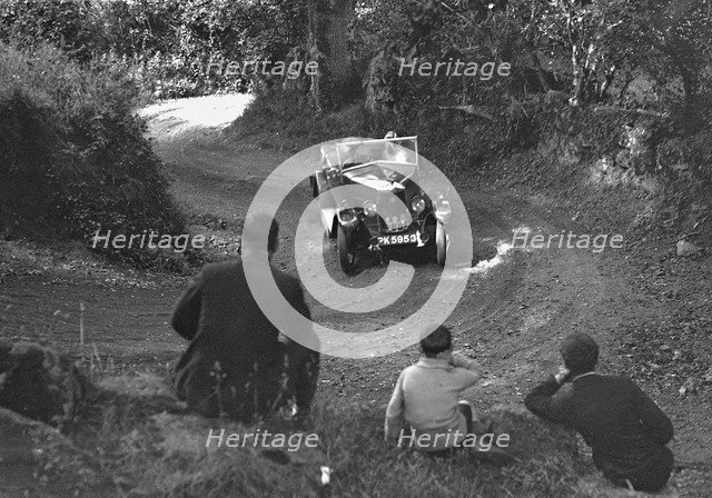 Riley of CJS Montague-Johnson, B&HMC Brighton-Beer Trial, Simms Hill, Ilsington, Devon, 1930. Artist: Bill Brunell.