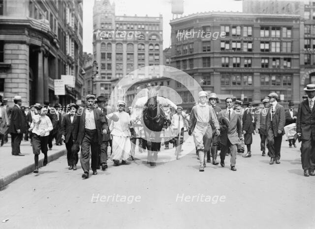D.H. Woolf and wife arriving in N.Y.C., 1910. Creator: Bain News Service.