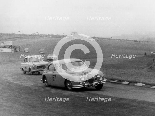 Jaguar 3.4 Mark1 at Brands Hatch 1957. Creator: Unknown.