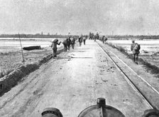 The Dark Hours of Italy; One of the Tagliamento bridges during the retreat..., 1917. Creator: Unknown.