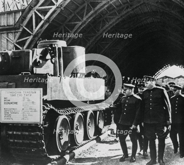 Russian generals inspecting an exposition of captured German armaments, Russia, 1943. Artist: Unknown