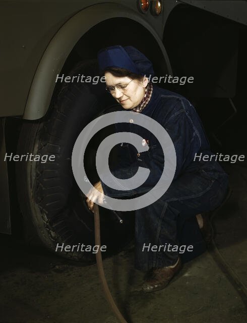 War production workers at the Heil Company making gasoline trailer tanks...Milwaukee, Wis, 1943. Creator: Howard Hollem.