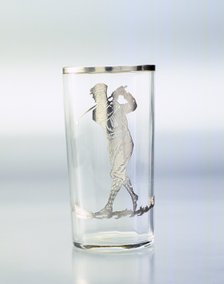 Drinking glass with silver overlay of golfer, United States, c1920. Artist: Unknown