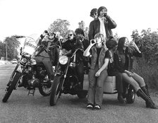 Young people on motorbikes, c1970.