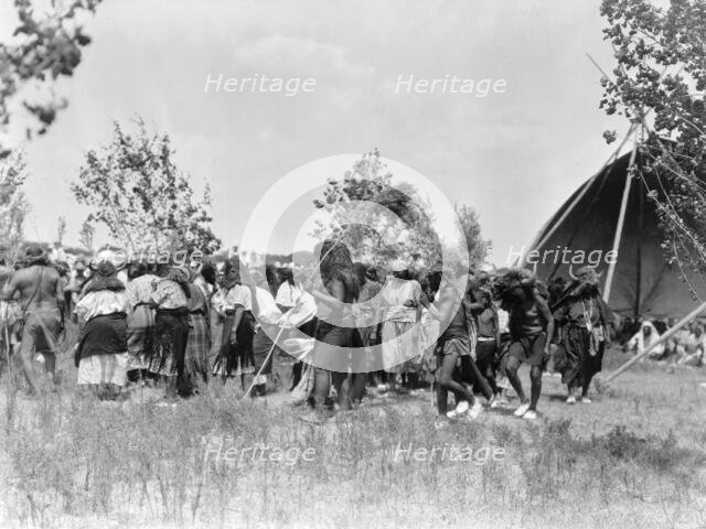Buffalo Society, animal dance-Cheyenne, c1927. Creator: Edward Sheriff Curtis.