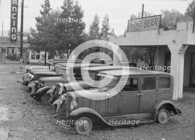 Roadside used car display on State Highway 17, Santa Clara County, California, 1939. Creator: Dorothea Lange.