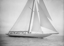 The 23-metre cutter 'Astra' sailing close-hauled, 1935. Creator: Kirk & Sons of Cowes.