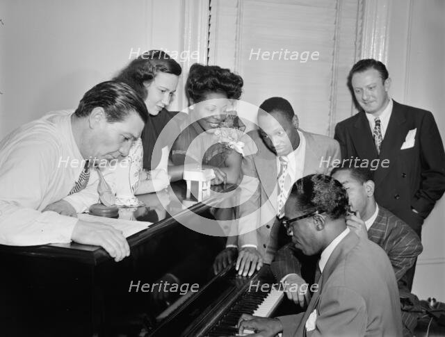 Portrait of Jack Teagarden, Dixie Bailey, Mary Lou Williams...Mary Lou Williams' apartment, NY, 1947 Creator: William Paul Gottlieb.