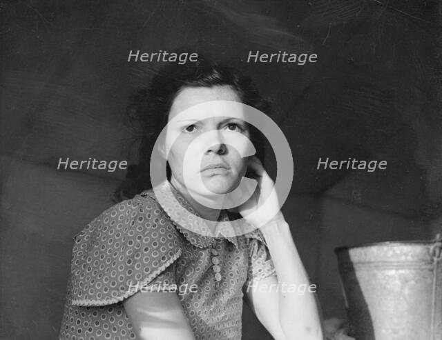 One of migratory family in FSA labor camp, Calipatria, Imperial Valley, California, 1939. Creator: Dorothea Lange.