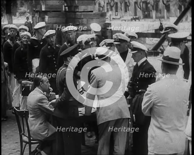 Captain Hans Langsdorff Discussing Arrangements for German Sailors With Naval Commanders..., 1939. Creator: British Pathe Ltd.