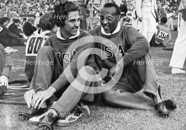 Helen Stephens and Jesse Owens, American athletes, Berlin Olympics, 1936. Artist: Unknown