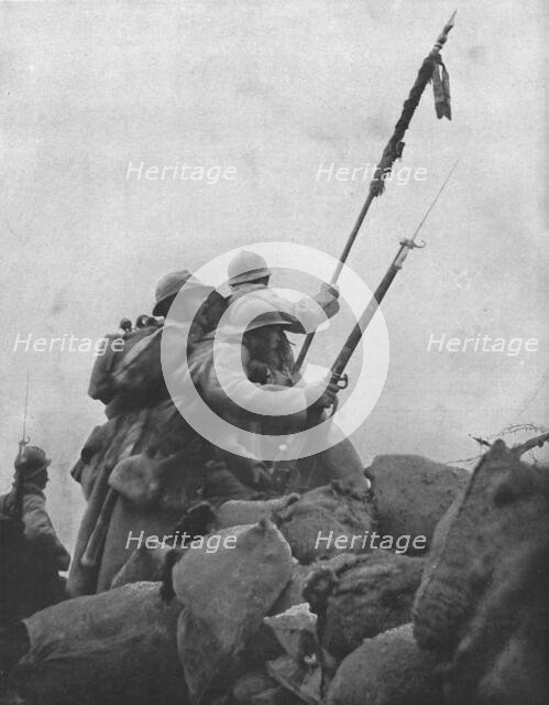 'Le drapeau a l'attaque; Le colonel desgrees du lou dressant, sous la mitraill...1915 (1924). Creator: Unknown.