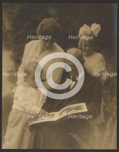Family Portrait with Picture Book, 1907-1943. Creator: Louis Fleckenstein.