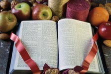 Harvest Festival display with open Bible.  Artist: A Pickford