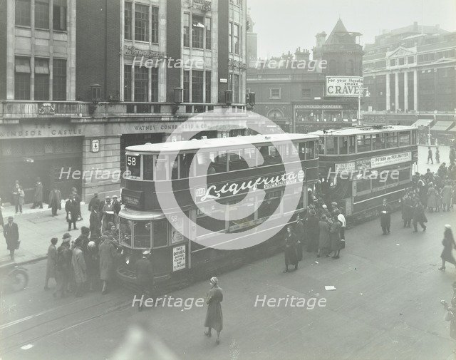 Electric trams at Victoria Terminus, London, 1932. Artist: Unknown.
