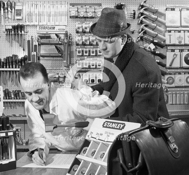 Twist your arm for an order, 1967.  Artist: Michael Walters