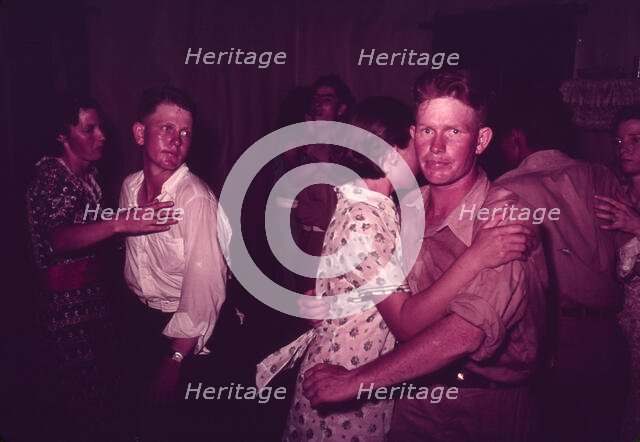 Couples at square dance, McIntosh County, Oklahoma, 1939 or 1940. Creator: Russell Lee.